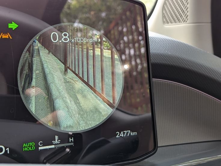 The driver digital instrument cluster integrates the blind-spot detection system that relays feed from the ORVM-mounted cameras while indicating to make a turn.