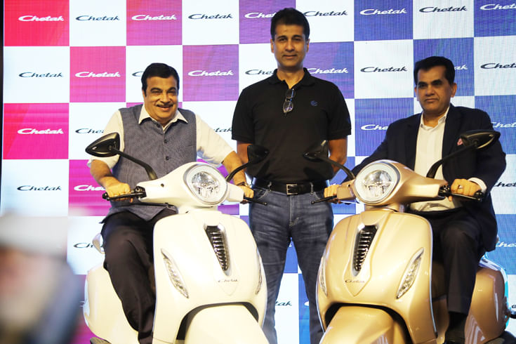 Nitin Gadkari, Minister of Road Transport and Highways; Rajiv Bajaj, MD, Bajaj Auto and Amitabh Kant, CEO, NITI Aayog unveil the Chetak electric scooter.