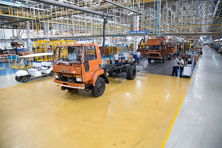 Trucks moving out of the assembly conveyor en route to be tested on a roller test bench. Once certified OK, they will make their way into the real world.