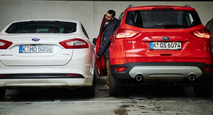 Remote parking helps people get out of a car after parking in a tight space