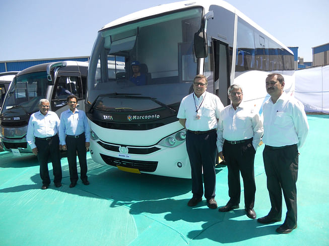 Senior company officials with the Magna. Manufacture of the bus is likely to begin in four months.