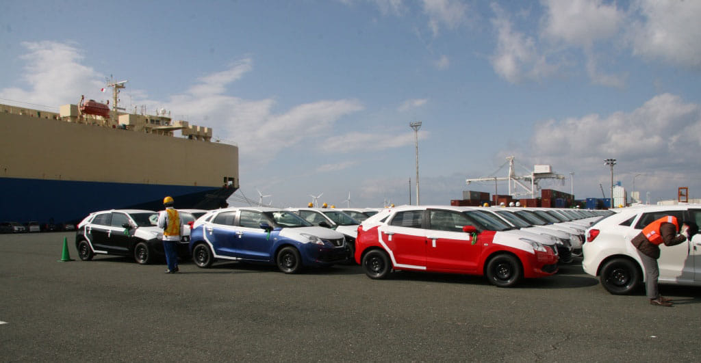 First shipment of 1,760 made-in-India Suzuki Balenos reaches Japan