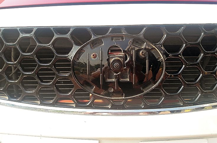 wide-angle cameras mounted on the car exterior