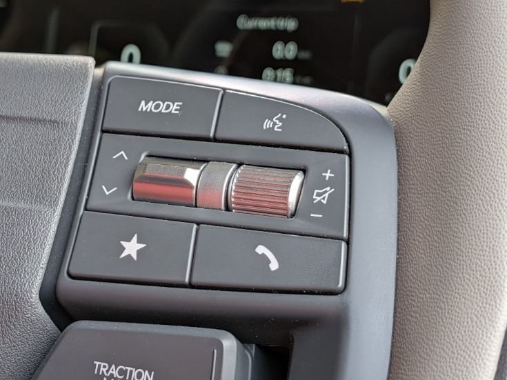 Functional demarcation with scroll-type buttons for volume control and toggle switches for multimedia and ACC offers additional layer of HMI refinement that aims to reduce driver distraction.