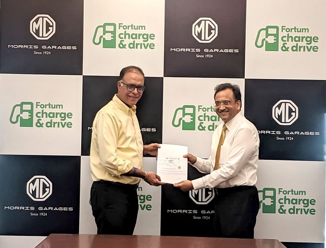 L-R: Rajeev Chaba, president and MD, MG Motor India and Sanjay Aggarwal, managing director, Fortum India.