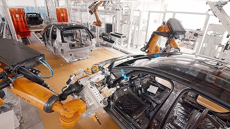 Durr and Volkswagen developed the automated tracking process where the car bodies are kept moving while the robots glue in the side windows.